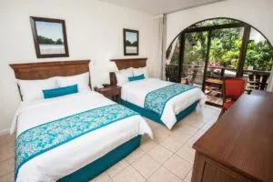 Sunny Punta Leona hotel room with back patio