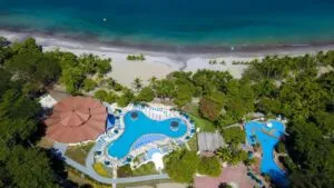 Aerial shot of Punta Leona hotel pool and beachfront